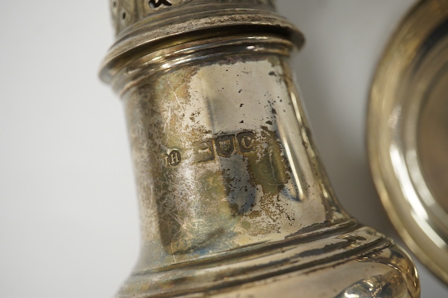 An Edwardian silver two handled silver porringer on stand, S.W. Smith & Co, London, 1904 and a late Victorian silver sugar caster, London, 1898, 12.7oz. Condition - fair to good